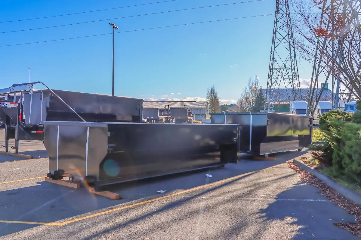 Roll-off dumpster ready for waste disposal at job site for 15 Yard Dumpster Rental in San Marcos